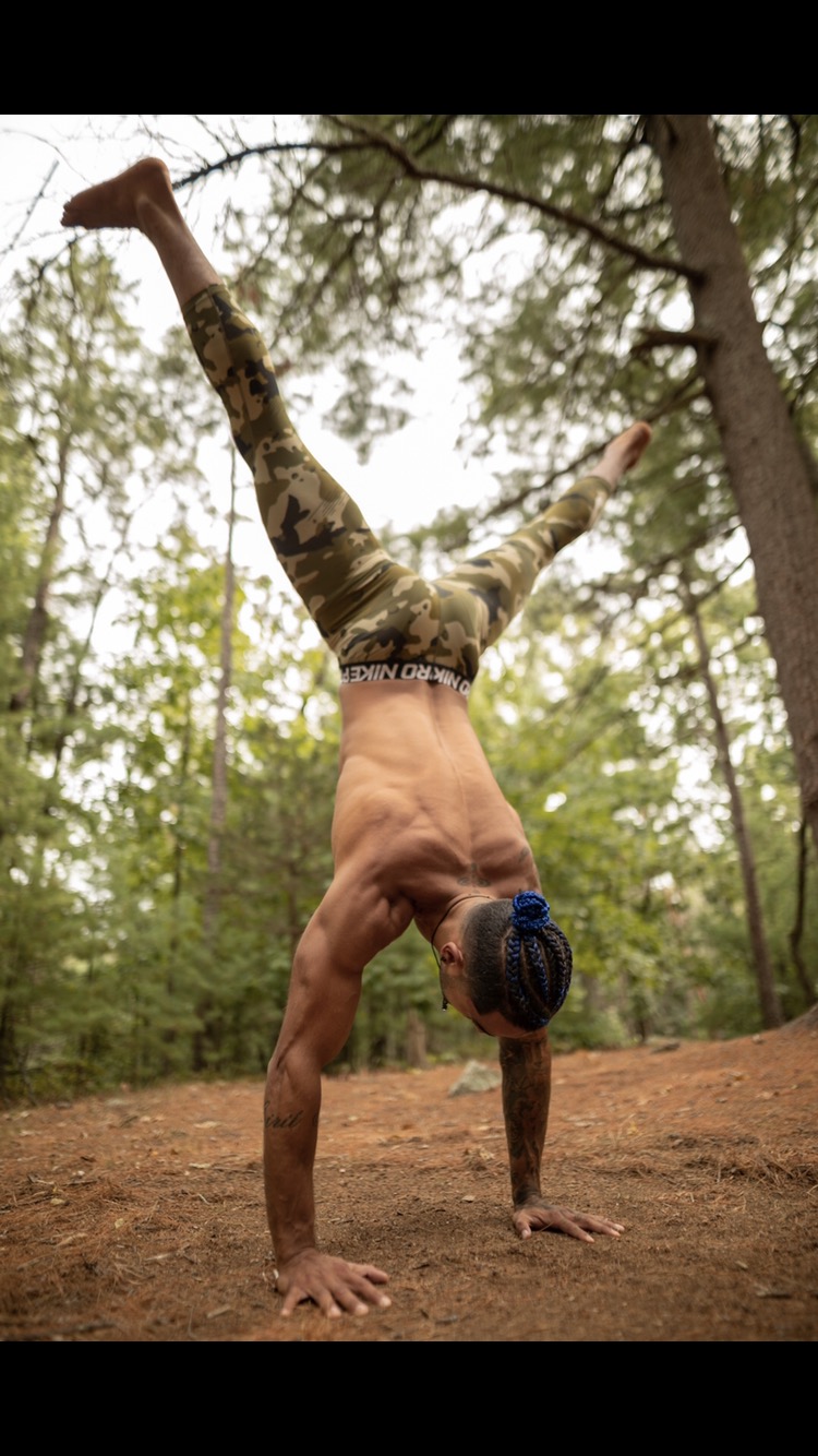 Gui handstand in the forest